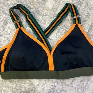 Green, Orange, and black sport bra